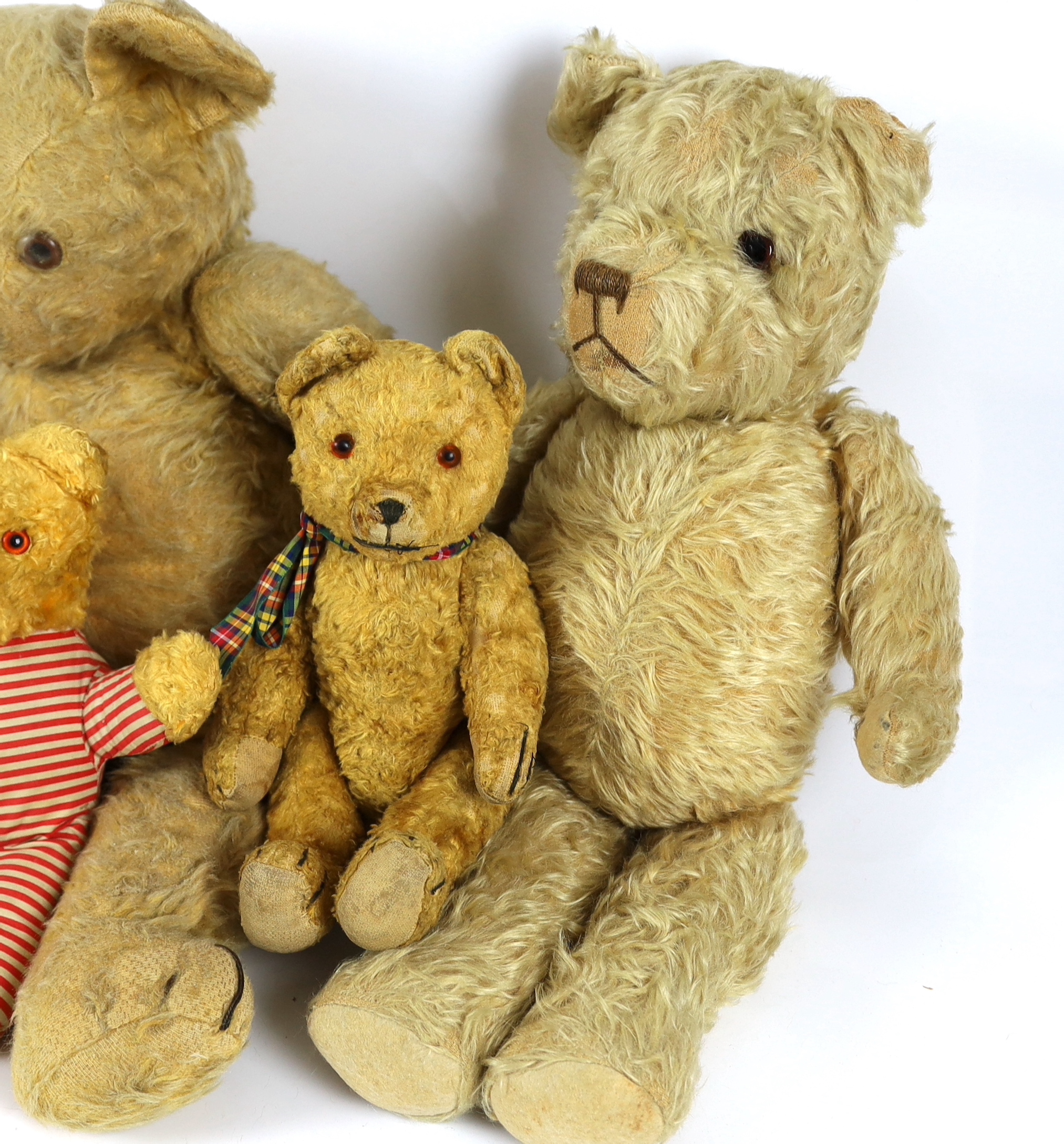 A light plush bear, and three others, 52cm (4)